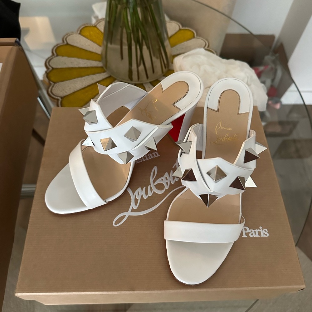 Worn once Louboutins great condition.